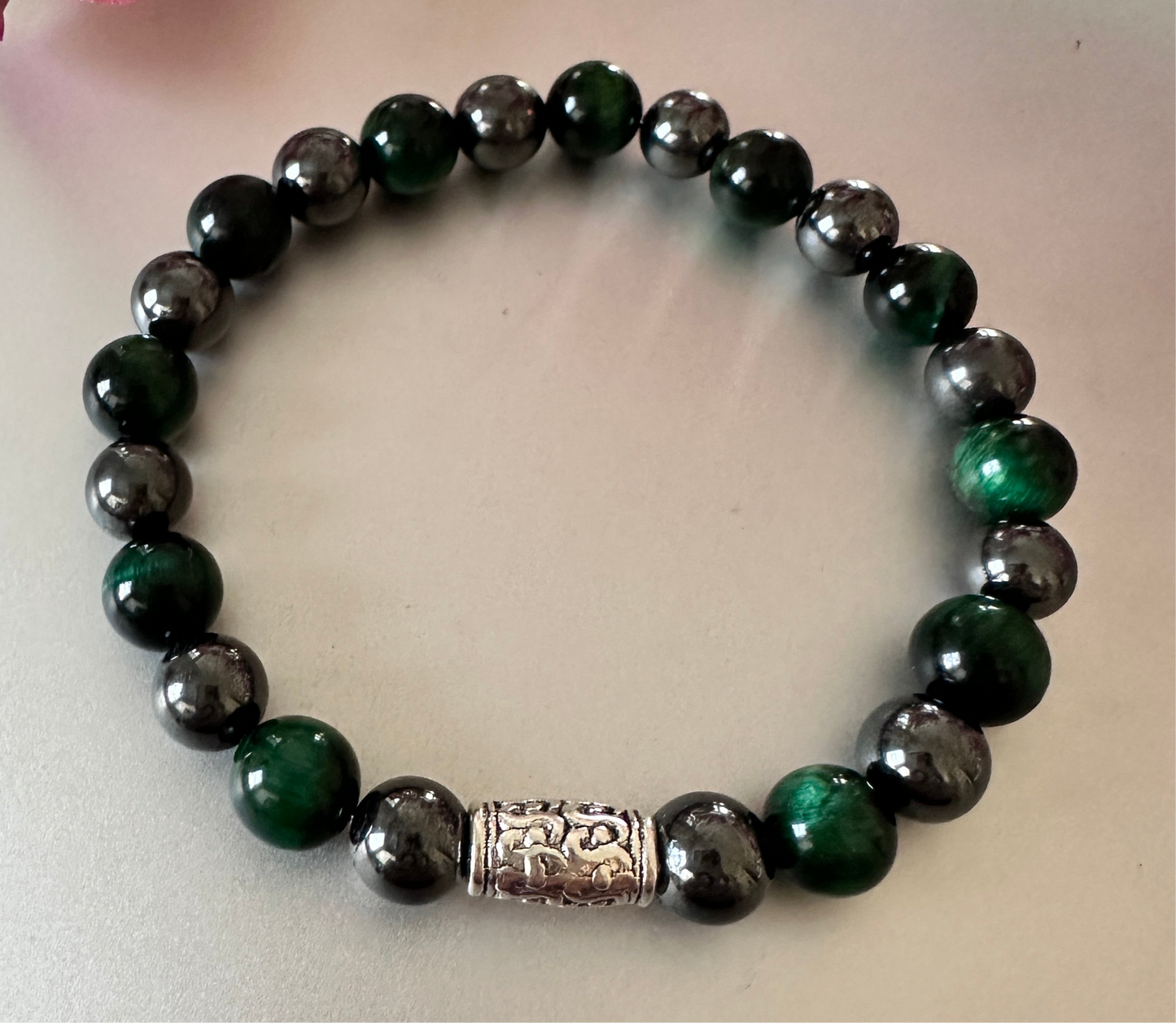 Hematite with green tigers eye bracelet.