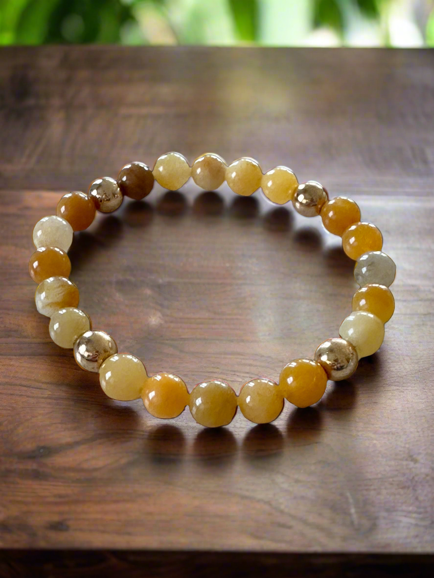 Amber stones with 18 K gold felt spacers stretch bracelet