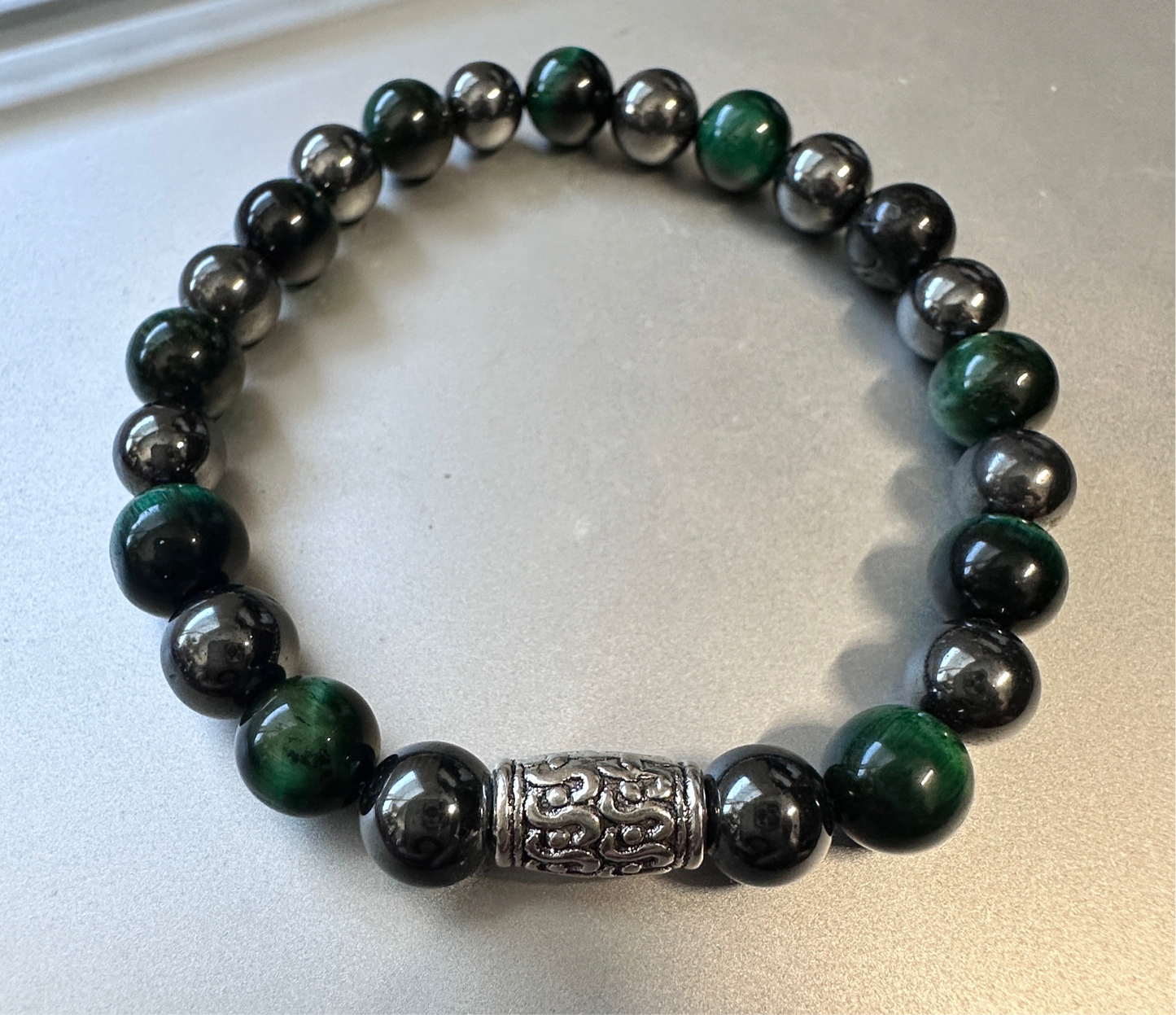 Hematite with green tigers eye bracelet.