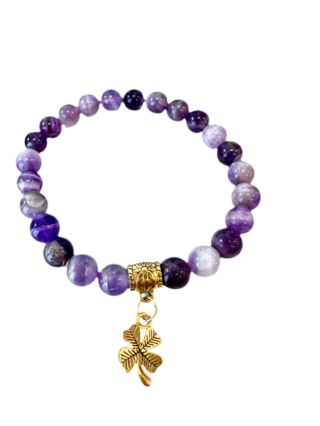 This handmade Amethyst stretch bracelet with spacers is a powerful stone with spiritual healing capabilities and makes a great gift for loved ones.