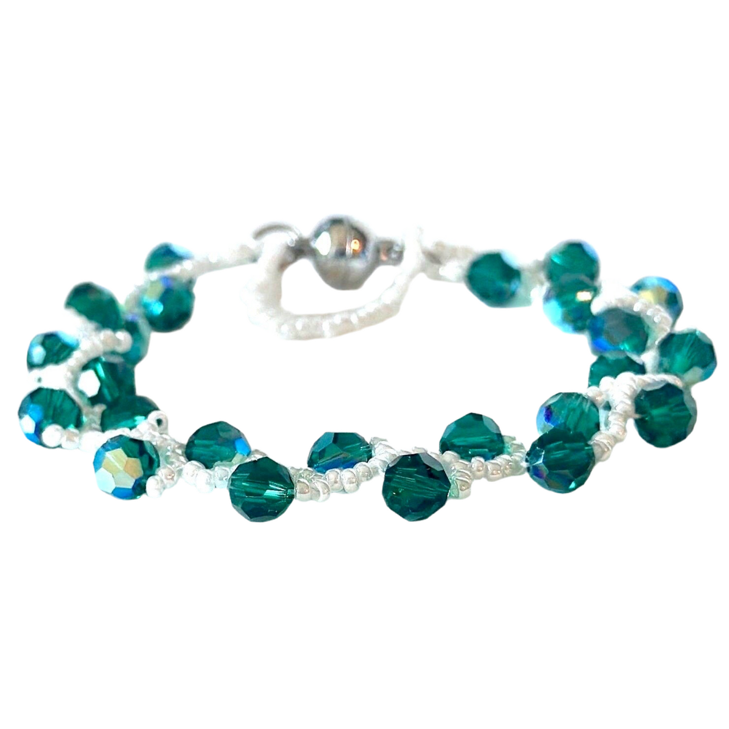 This Emerald Swarovski Crystal Vine Bracelet elegantly showcases white opaque luster Miyuki seed beads - Creations by Rosa