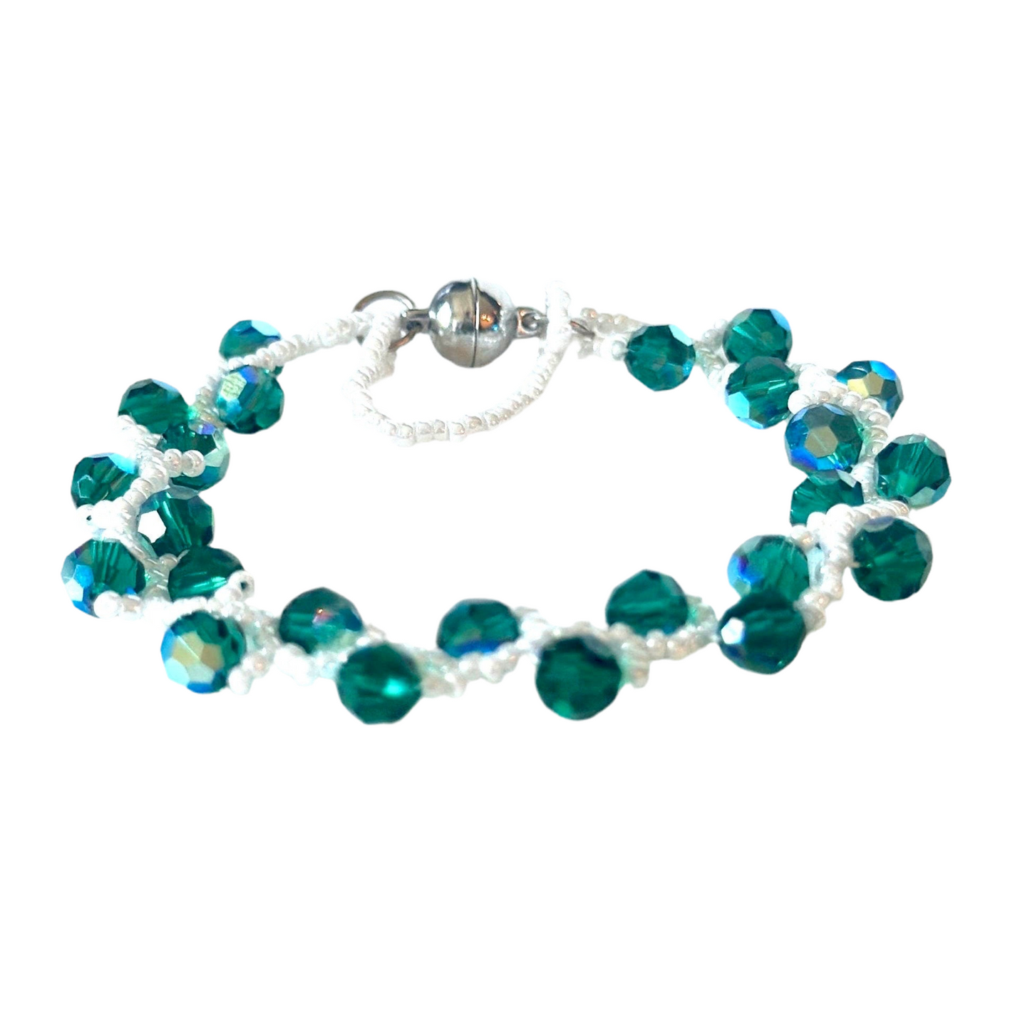 This Emerald Swarovski Crystal Vine Bracelet elegantly showcases white opaque luster Miyuki seed beads - Creations by Rosa