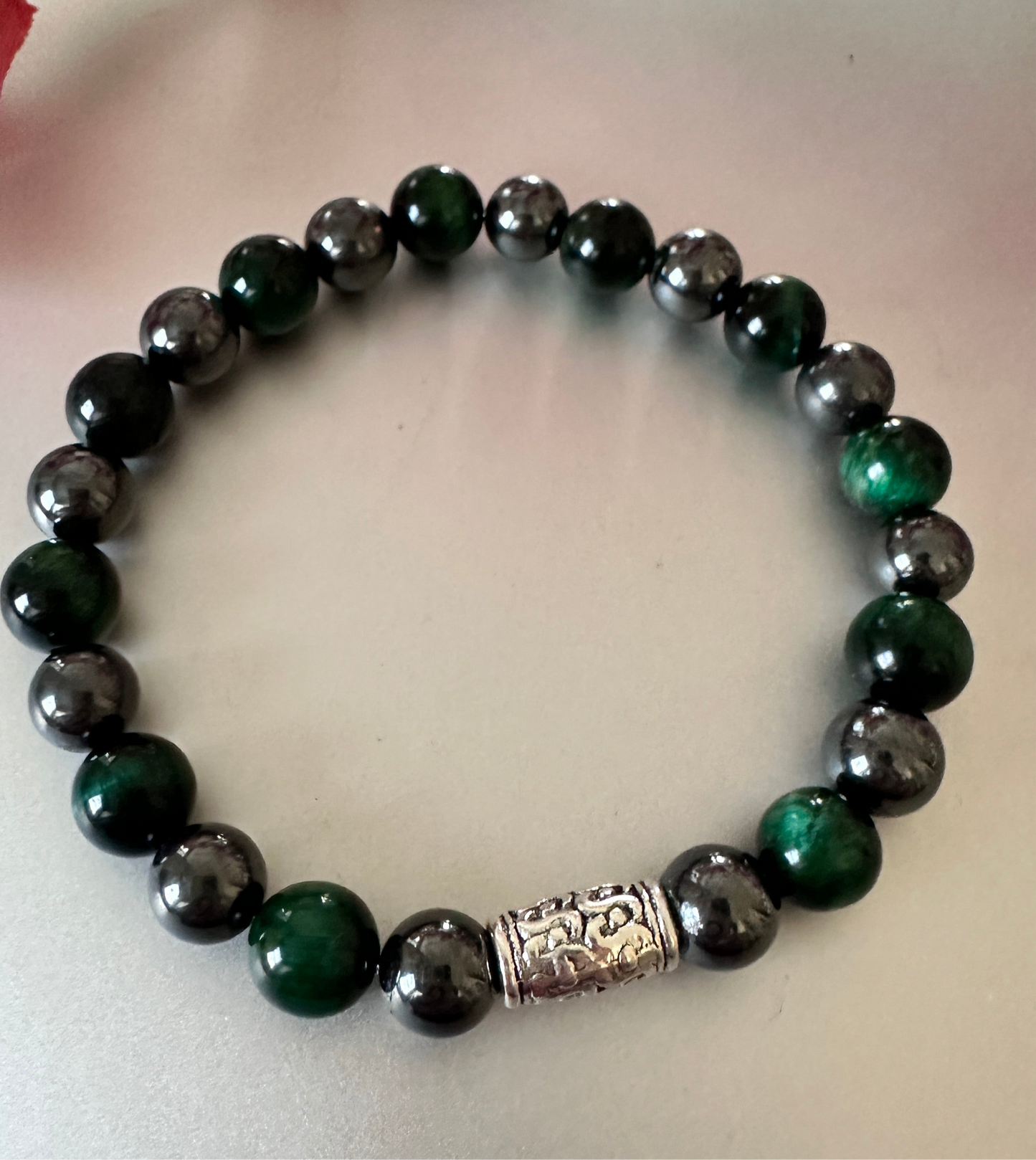 Hematite with green tigers eye bracelet.