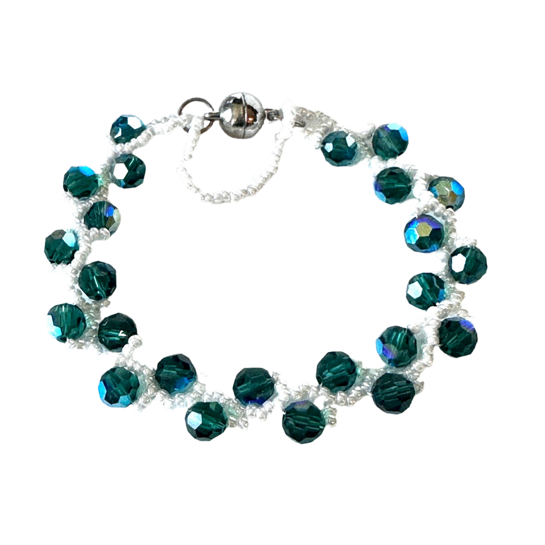 This Emerald Swarovski Crystal Vine Bracelet elegantly showcases white opaque luster Miyuki seed beads