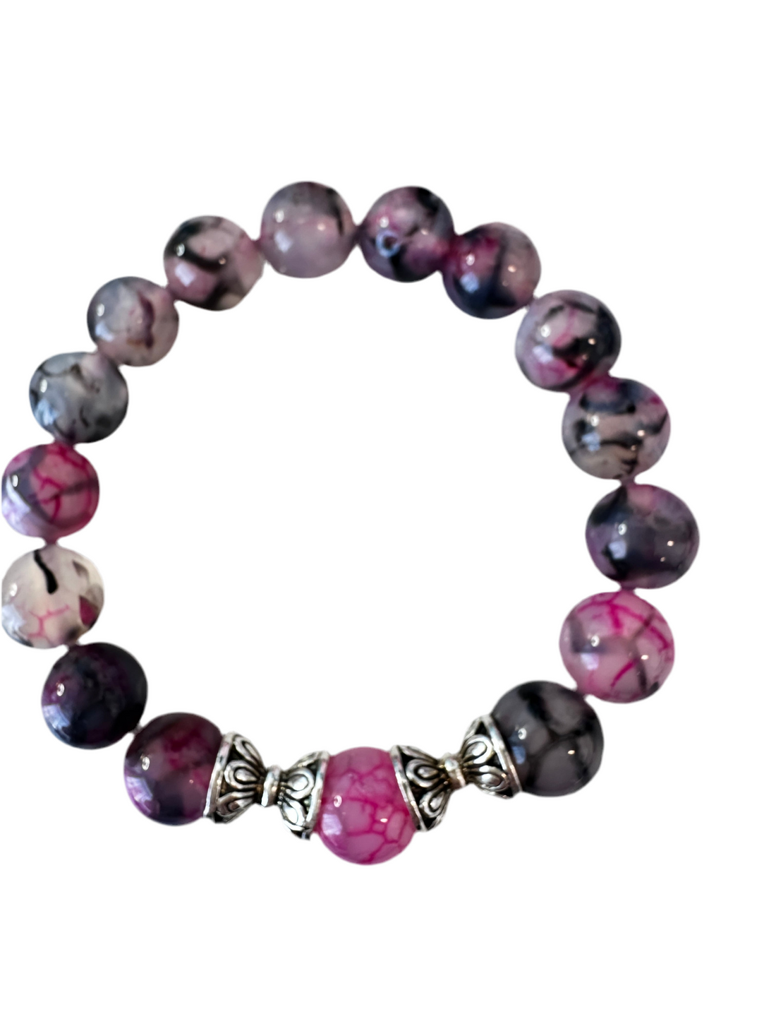 This handmade bracelet sports 10mm natural, high-grade beads, a secure stretchy cord, and a central agate dragon vein stone, complemented by two silver spacers.