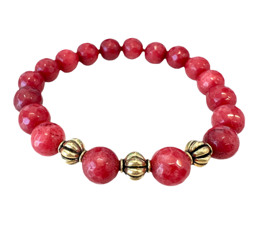 This Red Jade Beaded Gemstone Stretchy Bracelet is handmade and includes three spacers for enhanced visual appeal - making it the ideal present for friends and family.