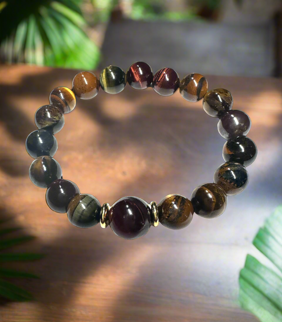 Tigers Eye stretch bracelet features gold plated spacers and one 12 mm stone for a unique accent.