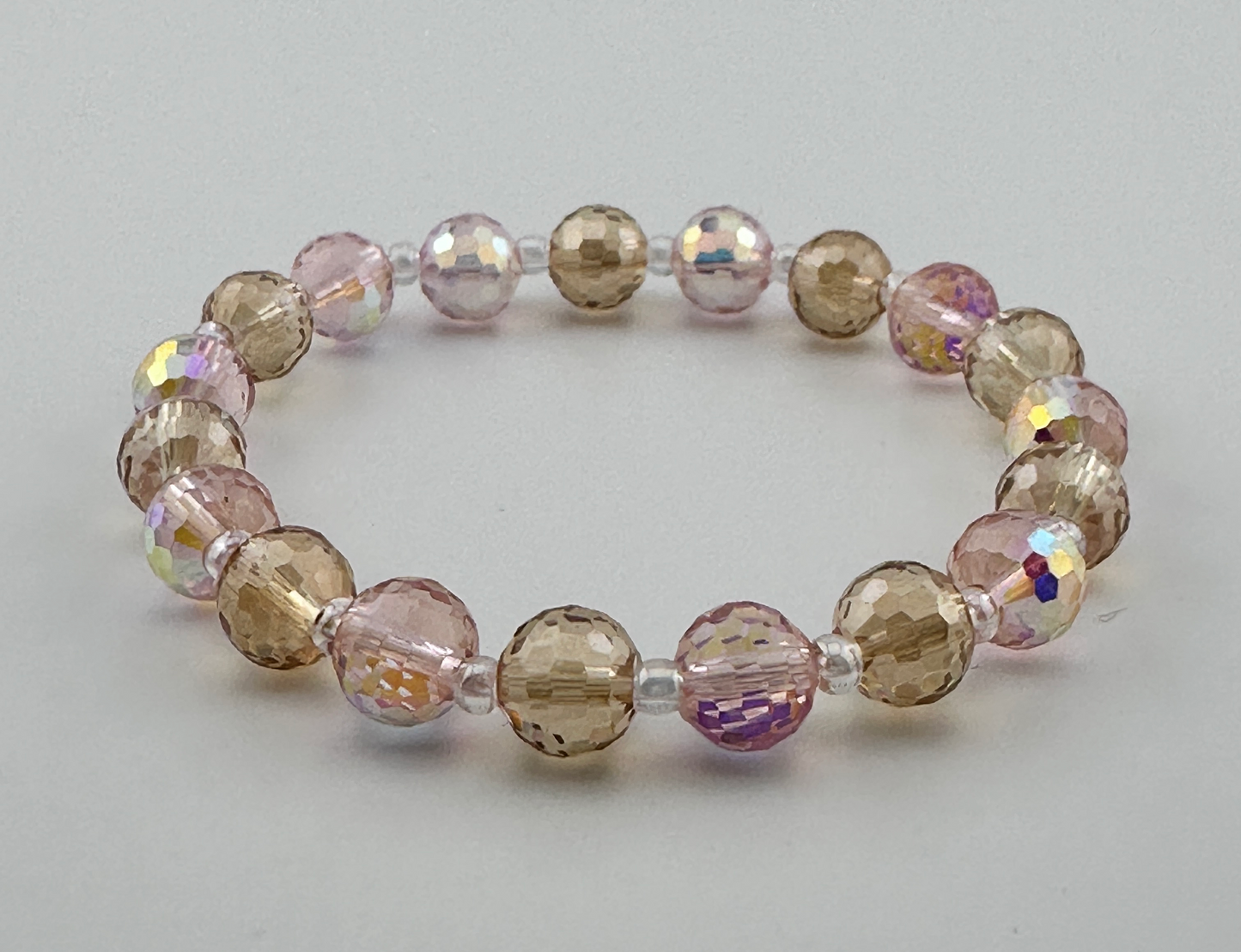 Pink & champagne carved beads Bracelet