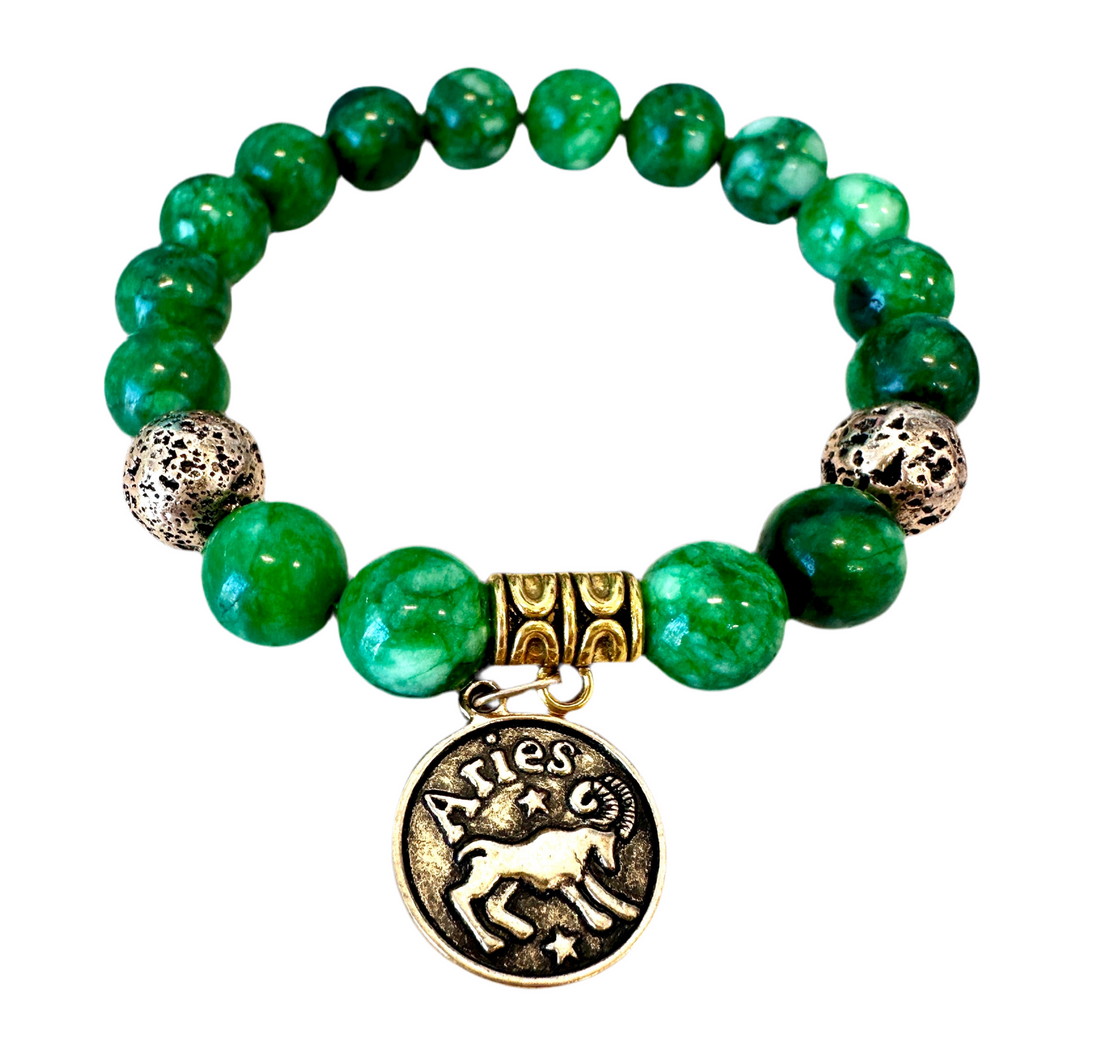 This elegant bracelet is crafted from natural Maw Sit Sit stone and features an ancient bronze volcanic rock bead, as well as a spacer with an Aries sign. An ideal accessory, this handmade piece of jewelry is sure to add a fashionable touch.