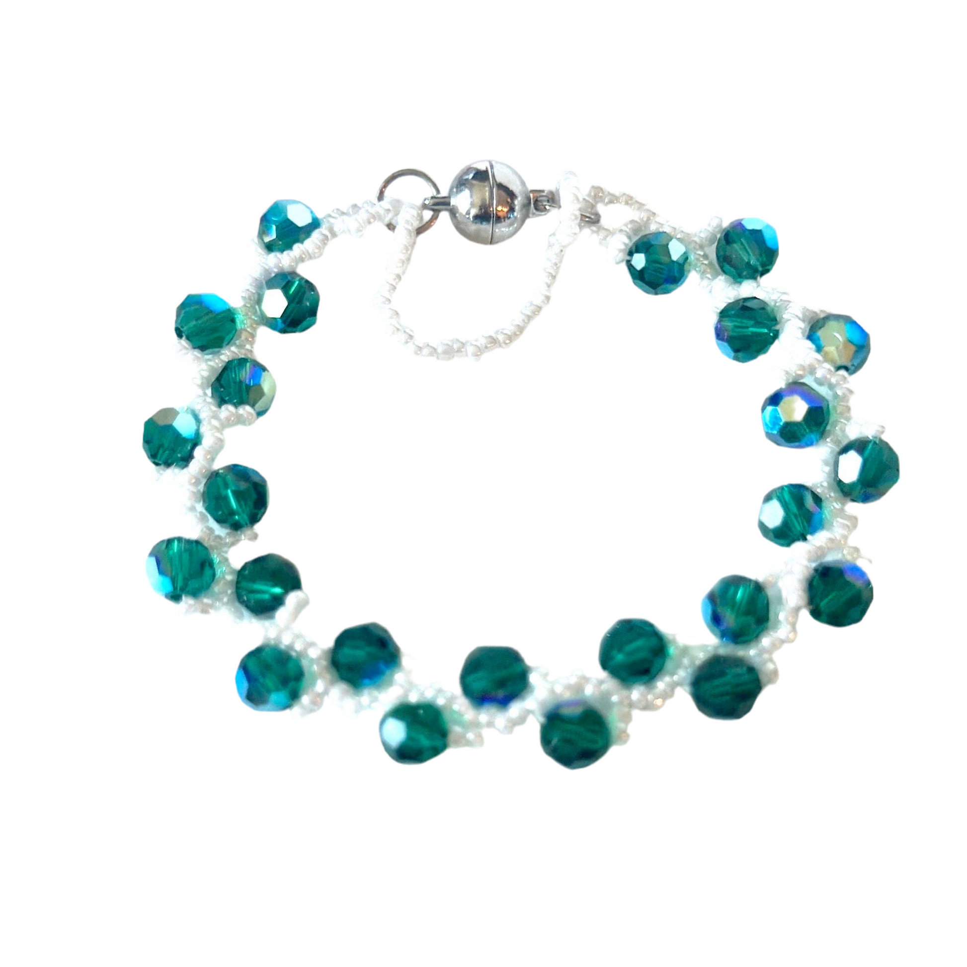 This Emerald Swarovski Crystal Vine Bracelet elegantly showcases white opaque luster Miyuki seed beads - Creations by Rosa