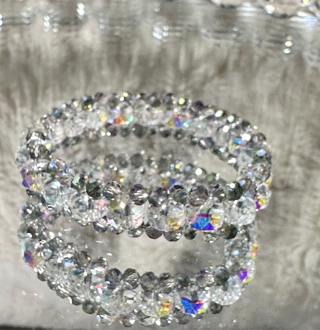 Austrian Crystal Glass Wheel Shape Round Faceted three tear Stretch Beaded Bracelet.