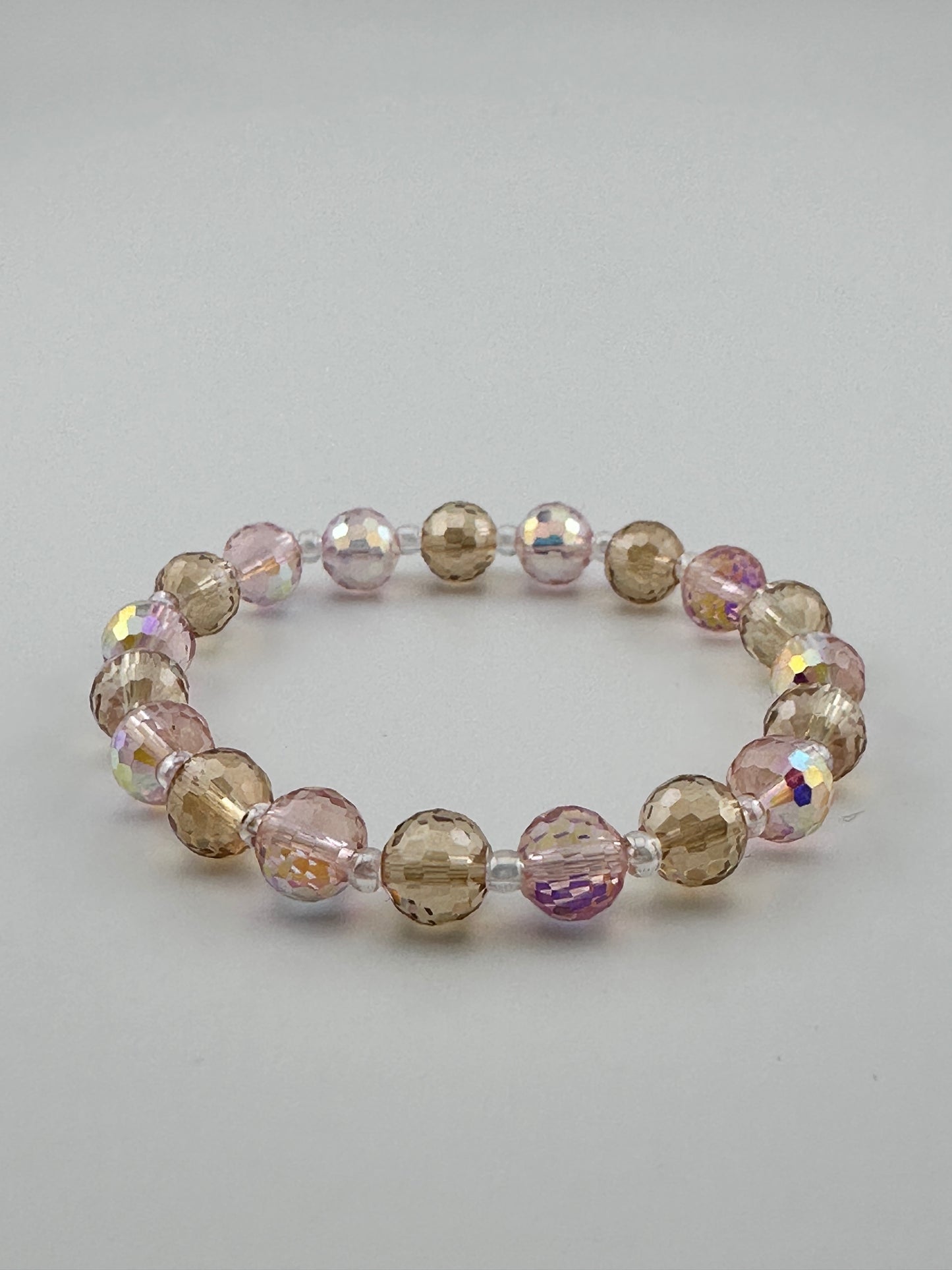 Pink & champagne carved beads Bracelet