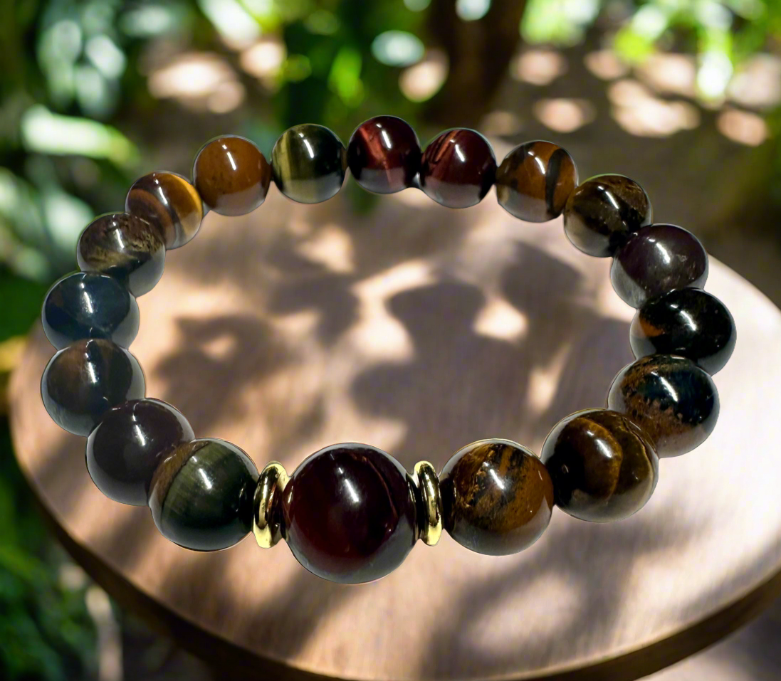 Tigers Eye stretch bracelet features gold plated spacers and one 12 mm stone for a unique accent.