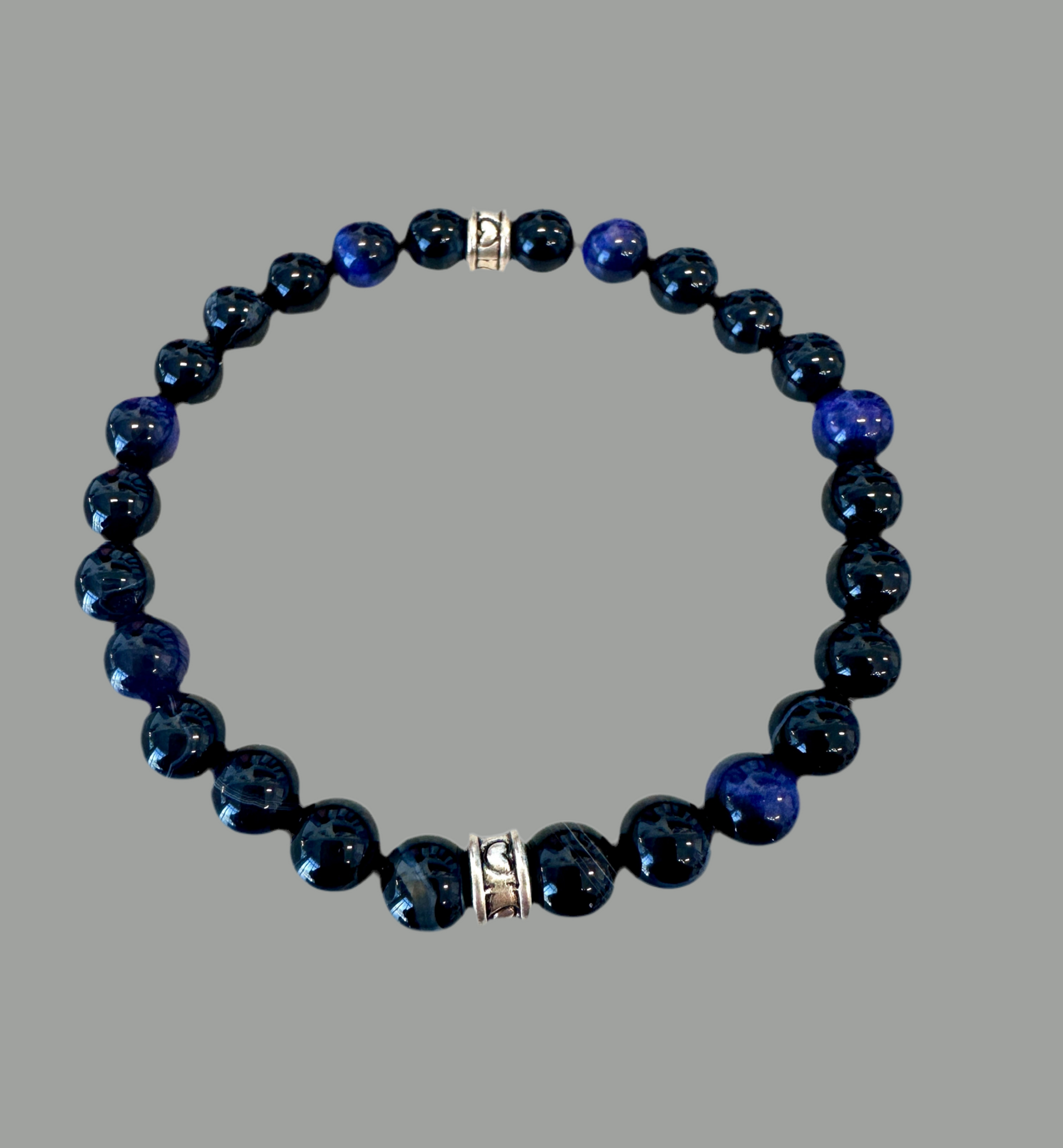 stretch bracelet features raw Black Chalcedony and Tigers Eye beads. - Creations by Rosa