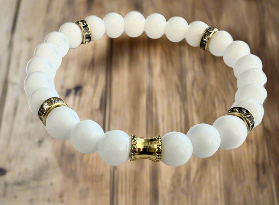 White Agate & Onyx Beads stretch, bracelet, with gold plated spacers.