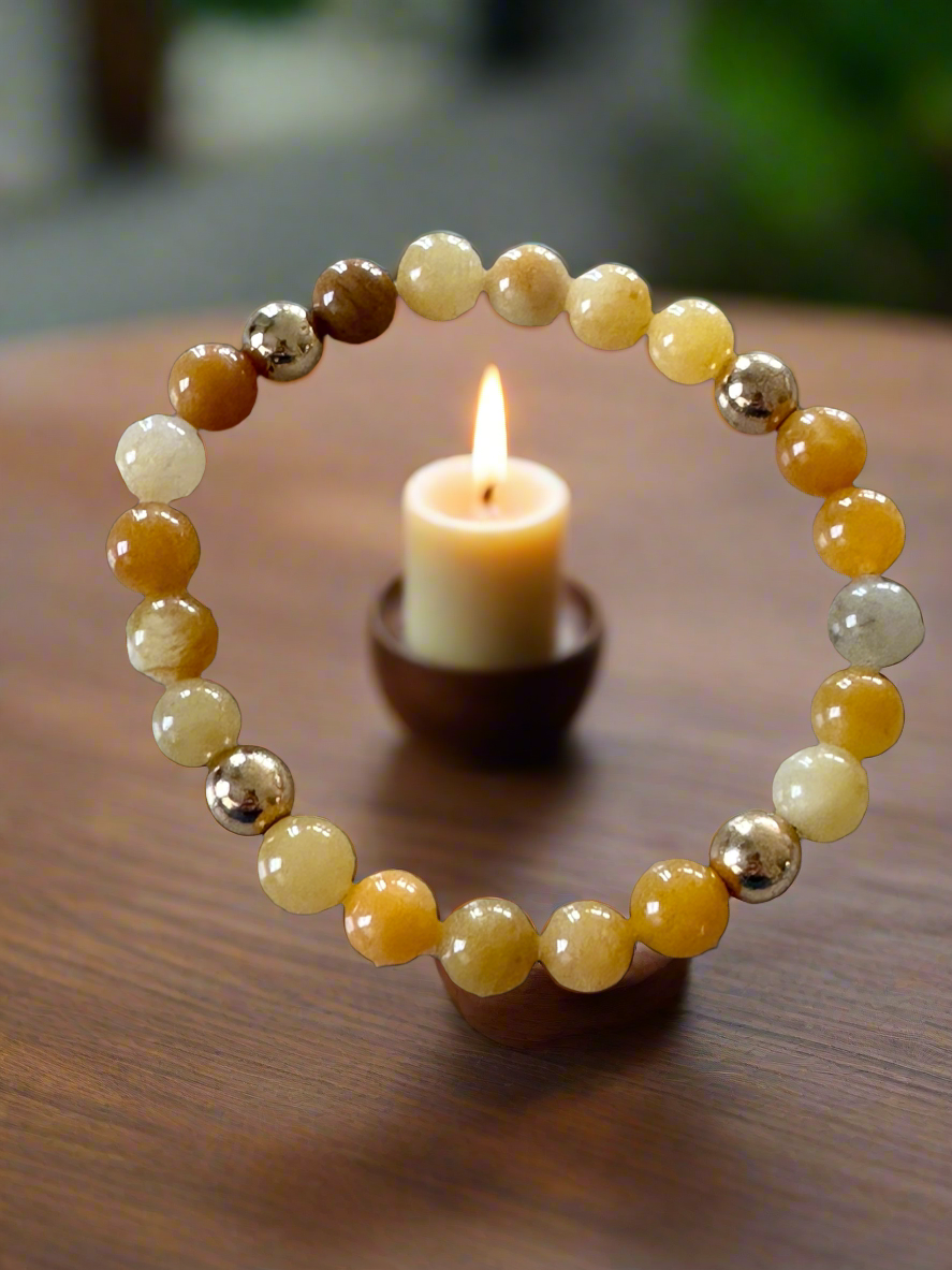 Amber stones with 18 K gold felt spacers stretch bracelet