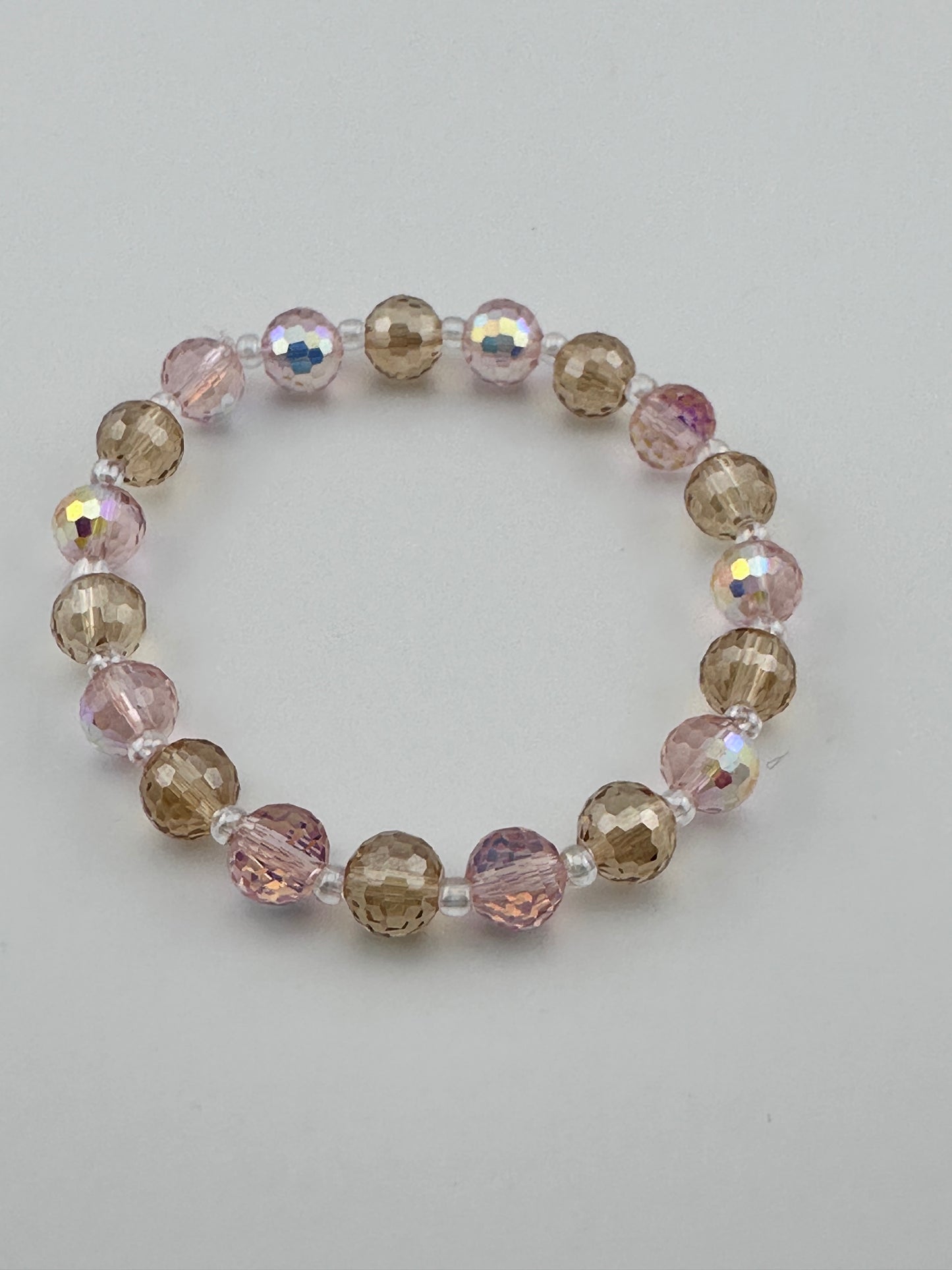 Pink & champagne carved beads Bracelet