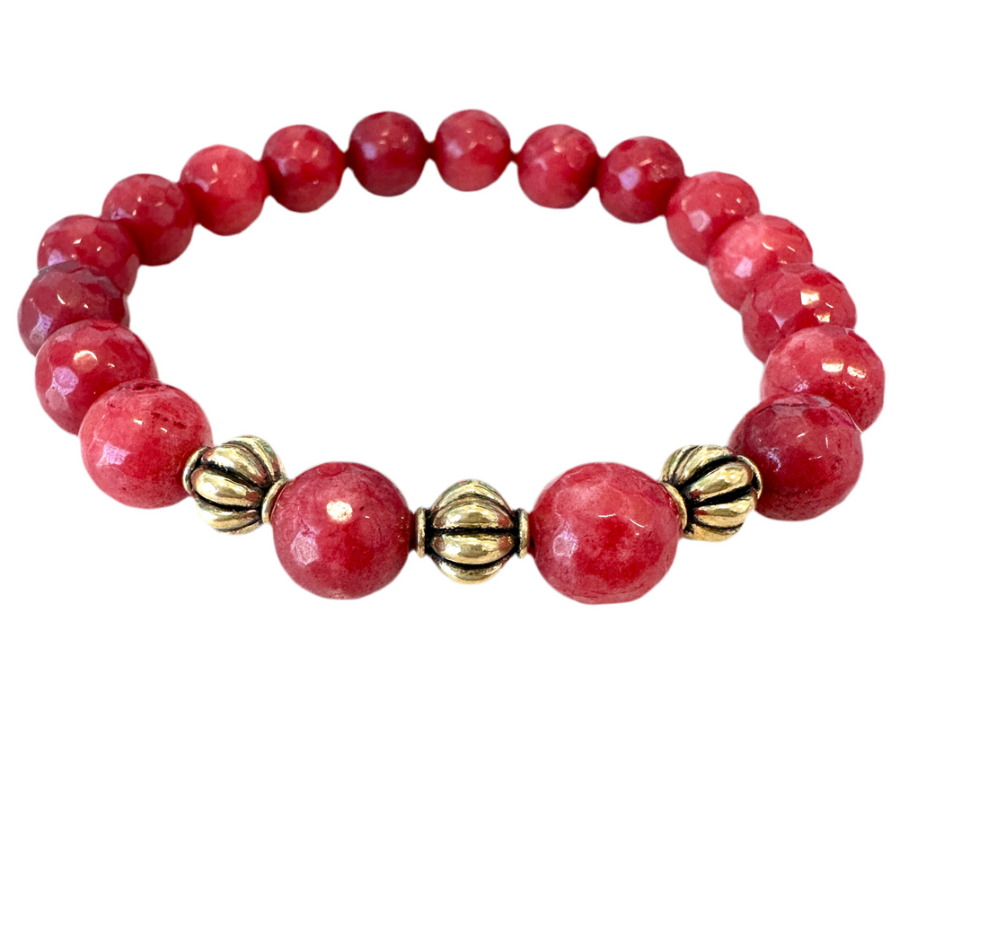 This Red Jade Beaded Gemstone Stretchy Bracelet is handmade and includes three spacers for enhanced visual appeal - making it the ideal present for friends and family.