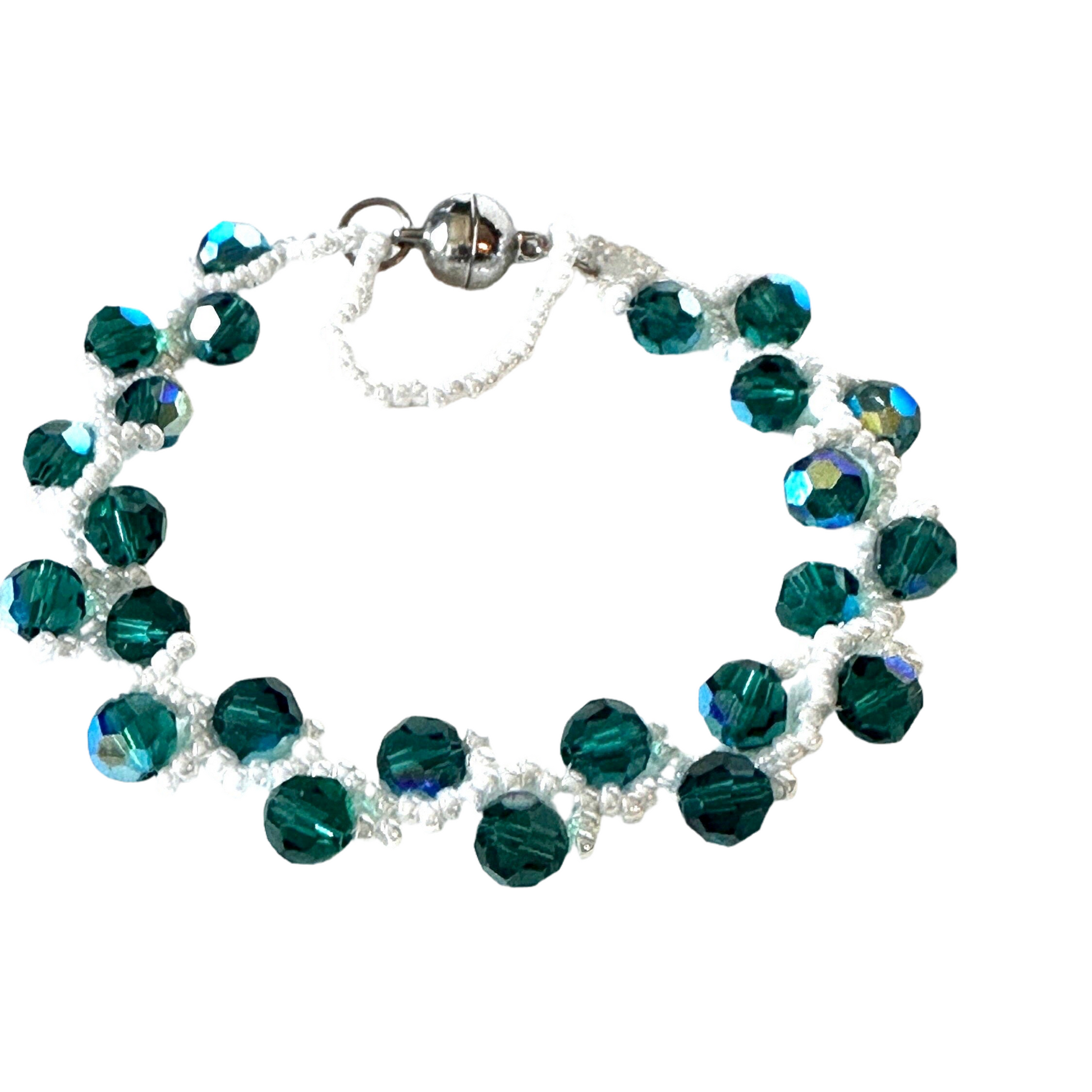 This Emerald Swarovski Crystal Vine Bracelet elegantly showcases white opaque luster Miyuki seed beads - Creations by Rosa