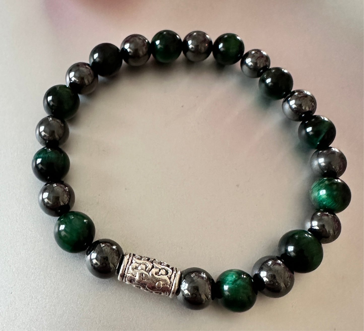 Hematite with green tigers eye bracelet.