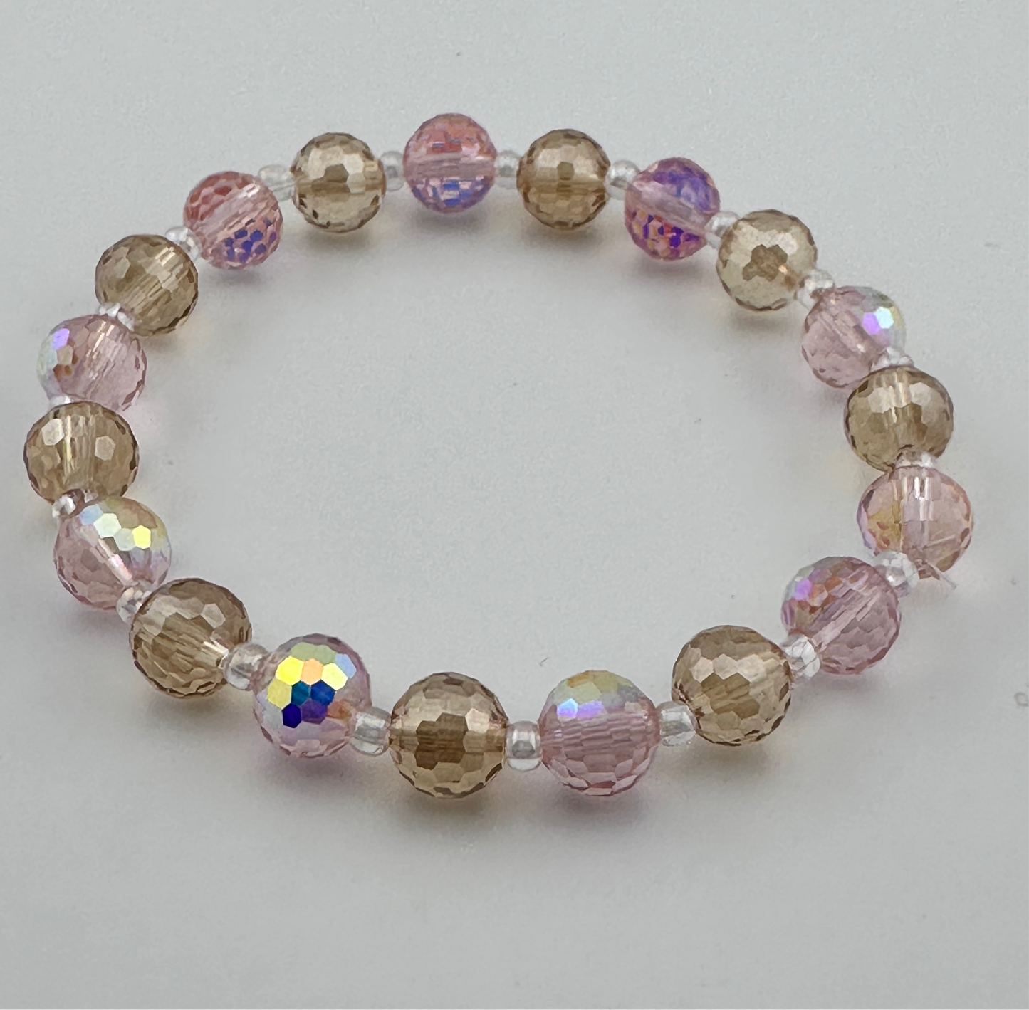 Pink & champagne carved beads Bracelet