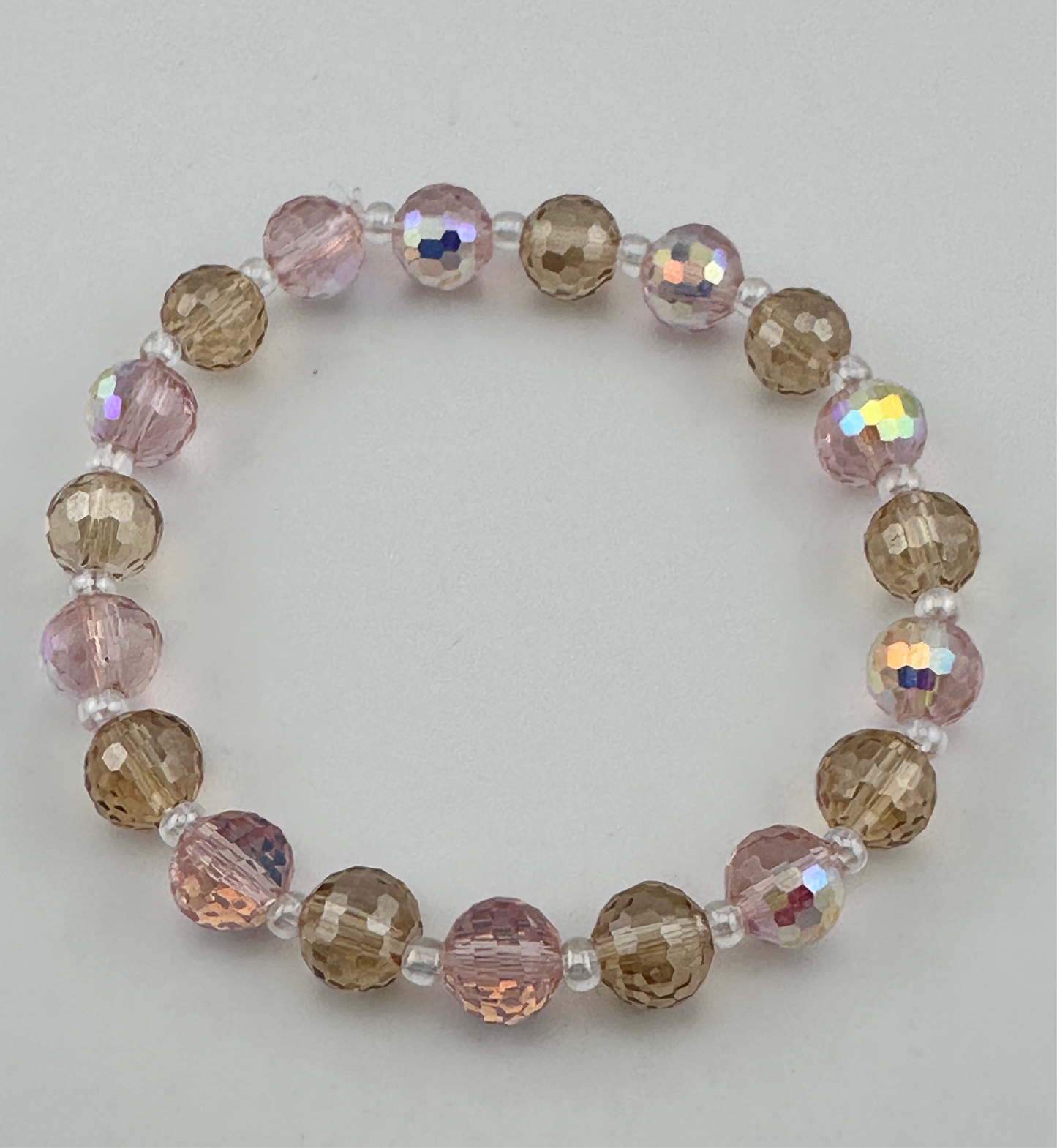 Pink & champagne carved beads Bracelet