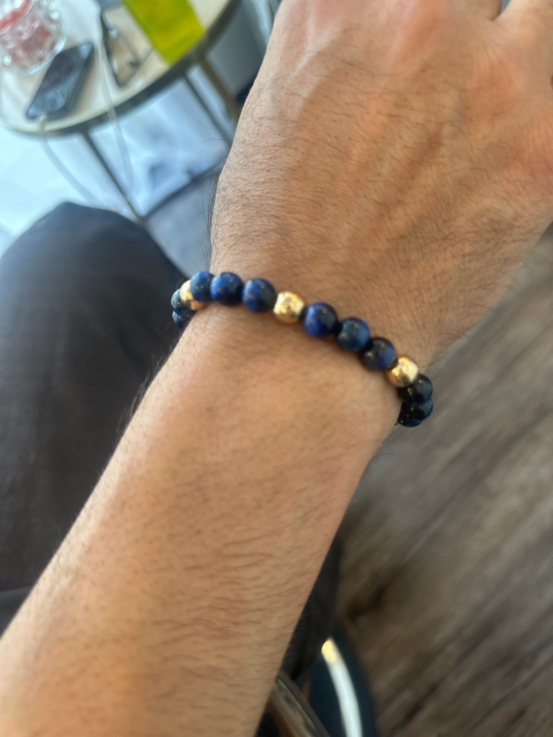 Tigers-Eye stretch bracelet, handcrafted with 6 gold-plated beads.