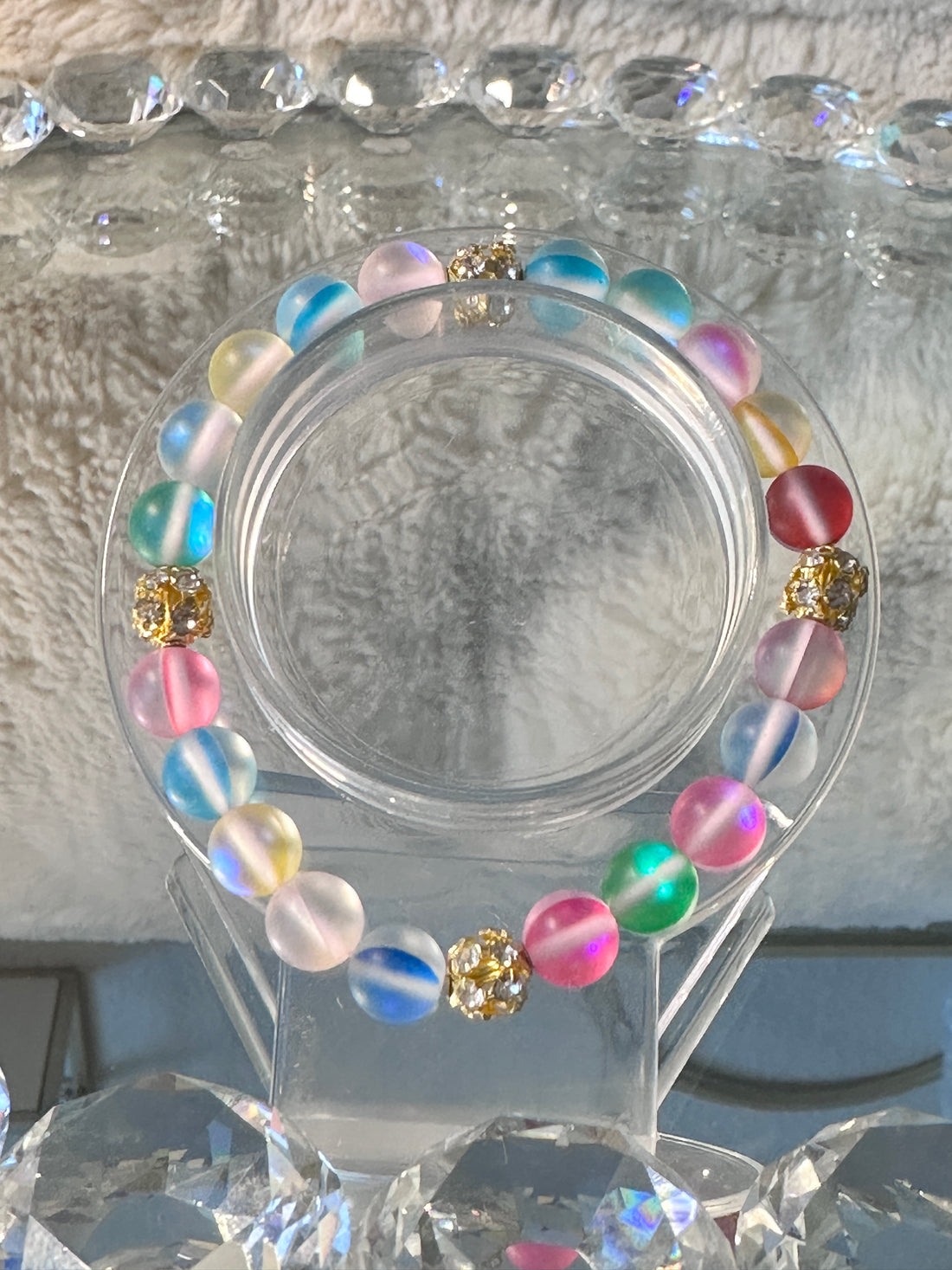 Matte Aurora Crystal Glass Beads stretch bracelet.