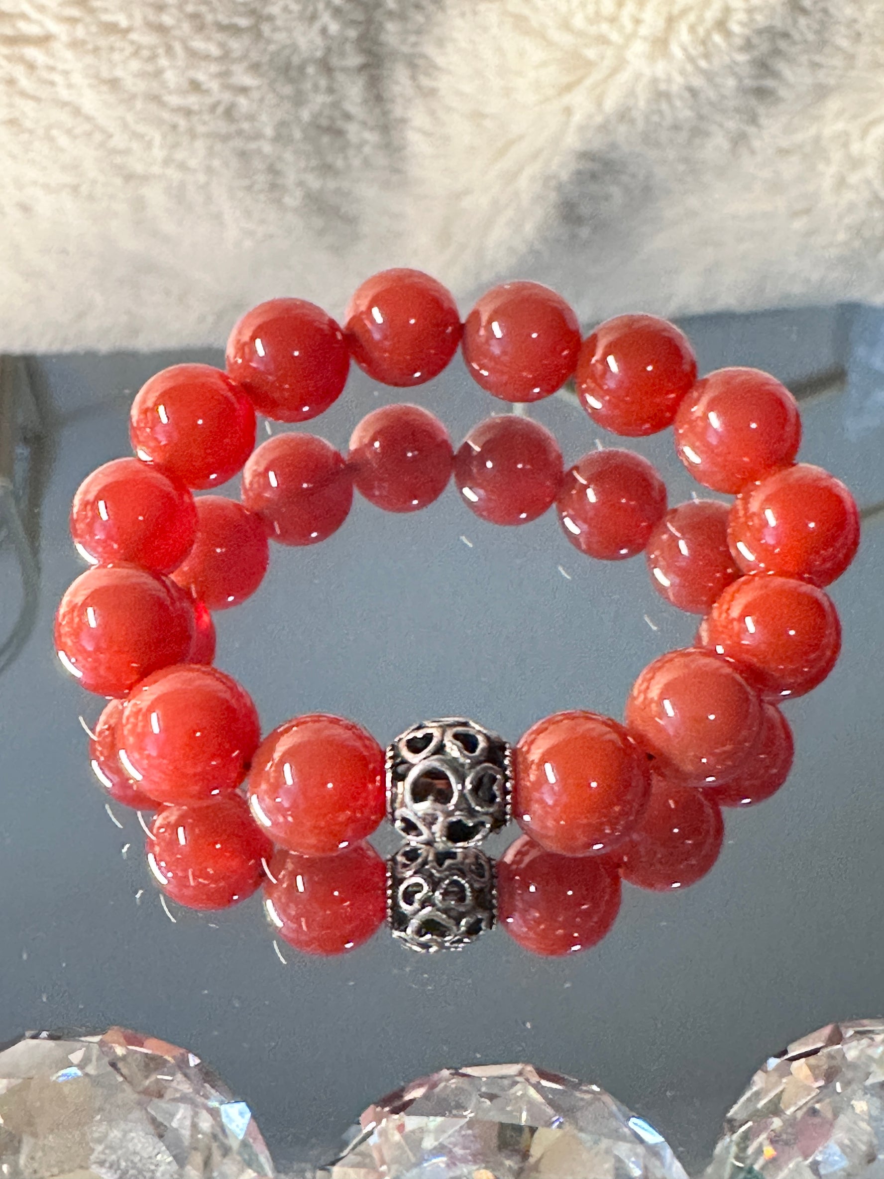 This 12M stretch bracelet is crafted with Red Onyx Agate Beads, cubic zirconia balls, and rhinestone spacers- a lovely combination fit for gifting to friends and family.