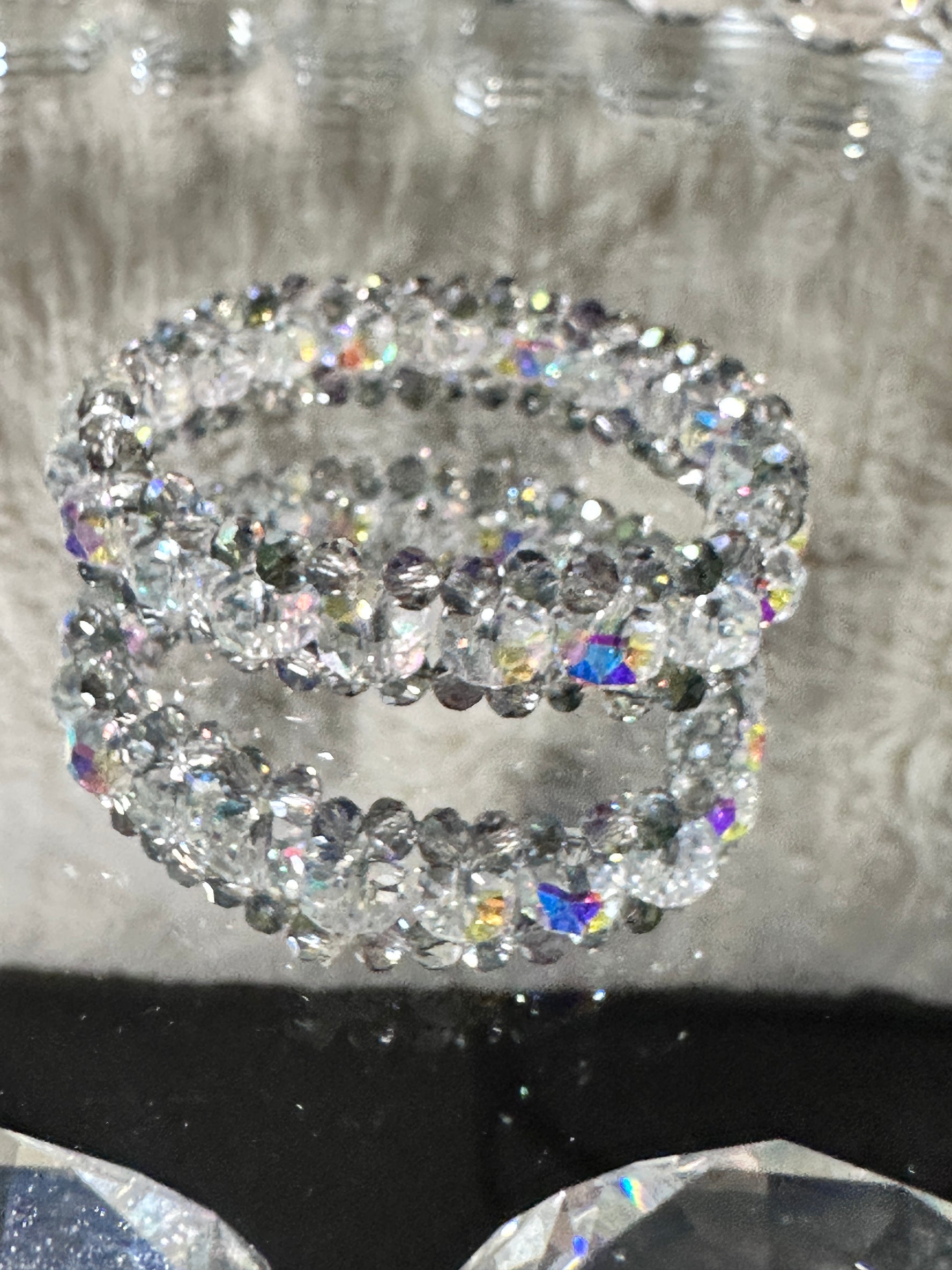 Austrian Crystal Glass Wheel Shape Round Faceted three tear Stretch Beaded Bracelet.